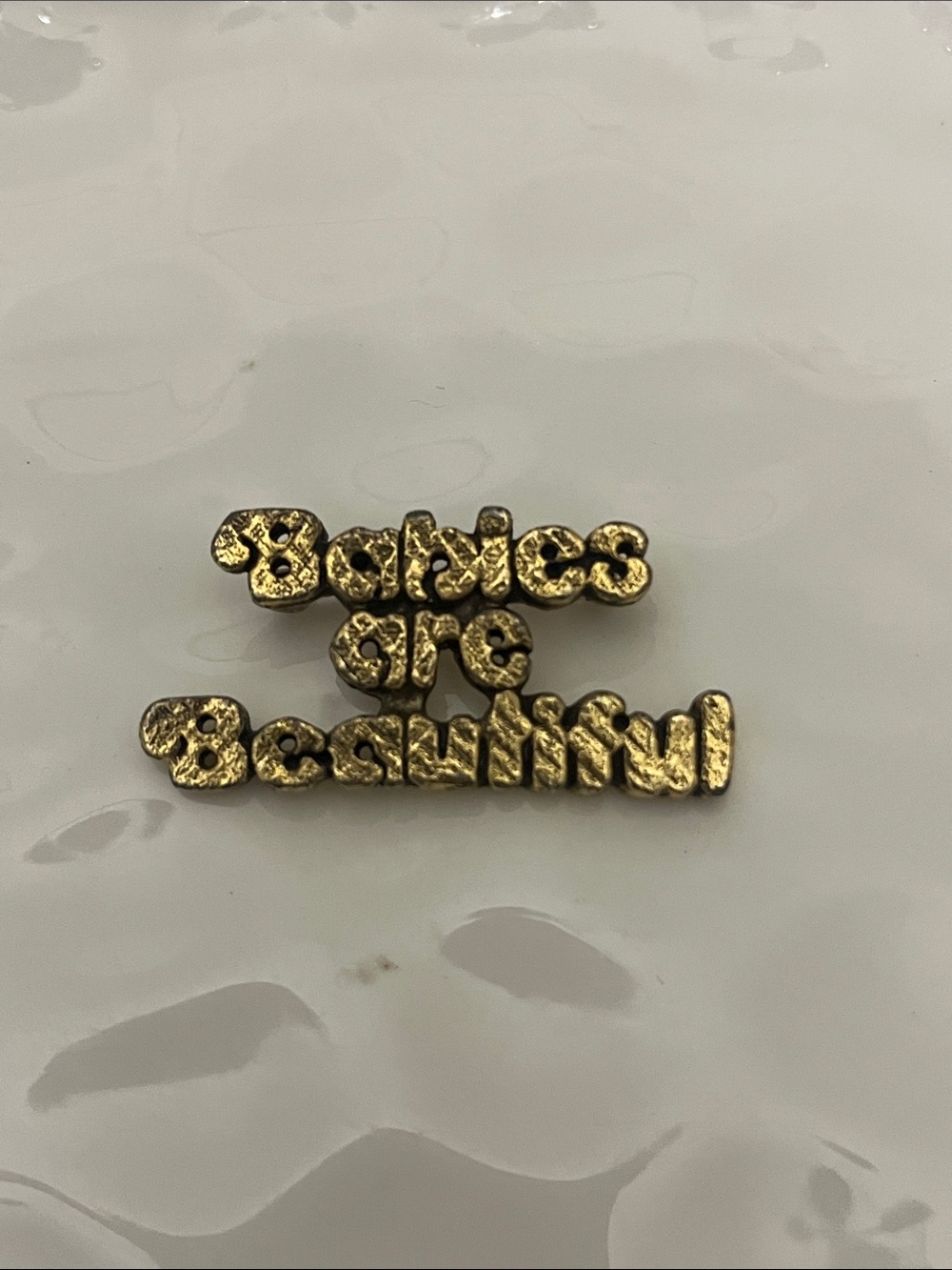 Vintage “Babies are Beautiful" Gold Tone Pin